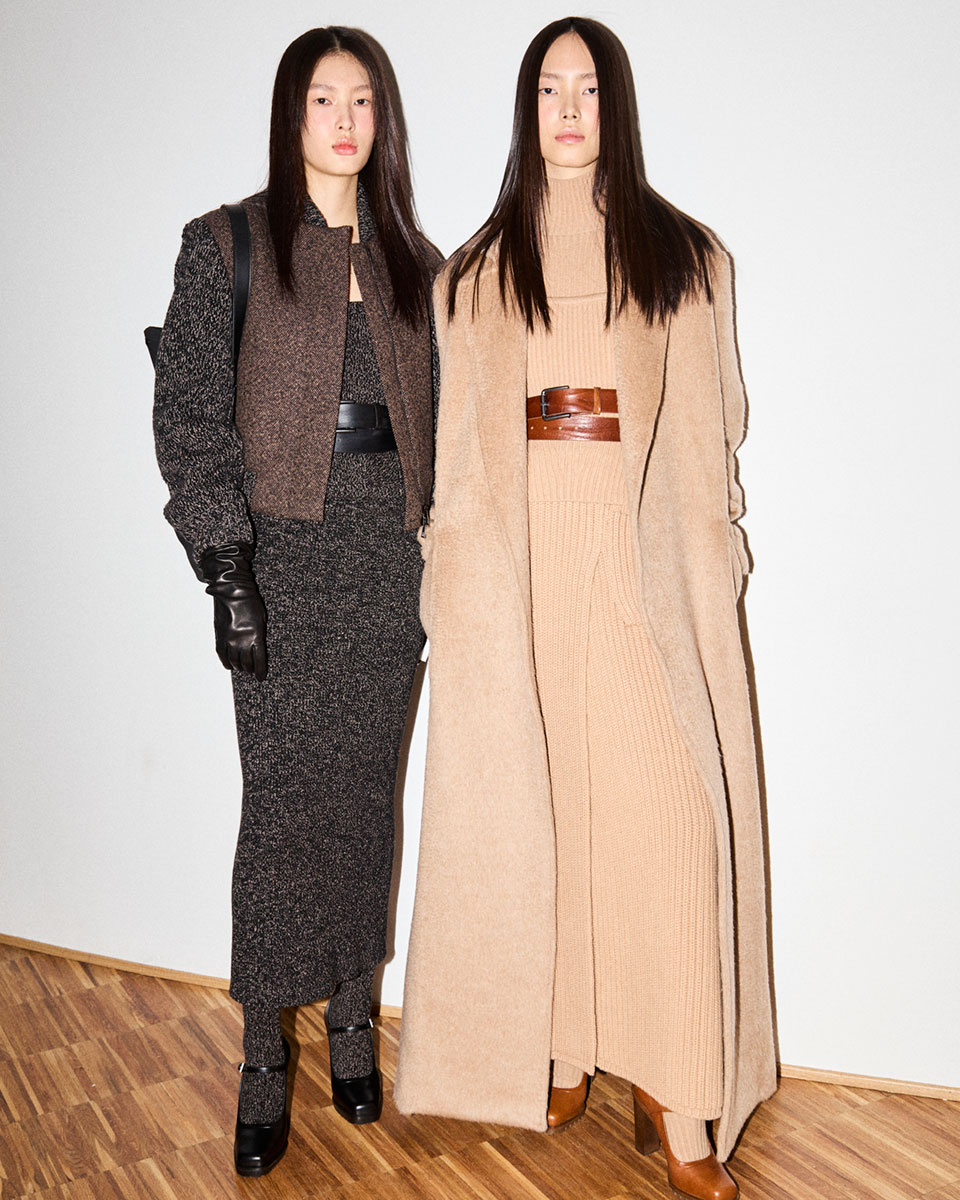 Max Mara Fall/Winter 2025 Fashion Show - Backstage shot of two models’ looks.